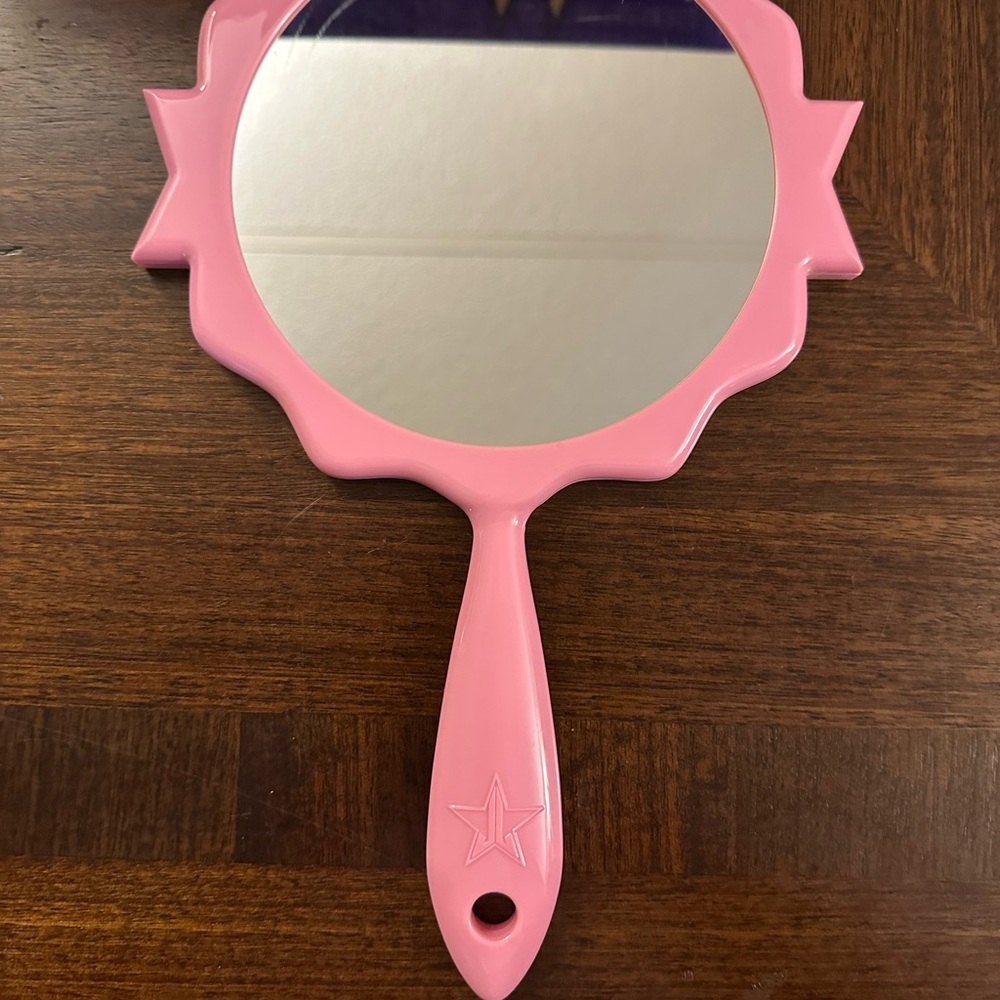 Pink Handheld Mirror with Star Logo